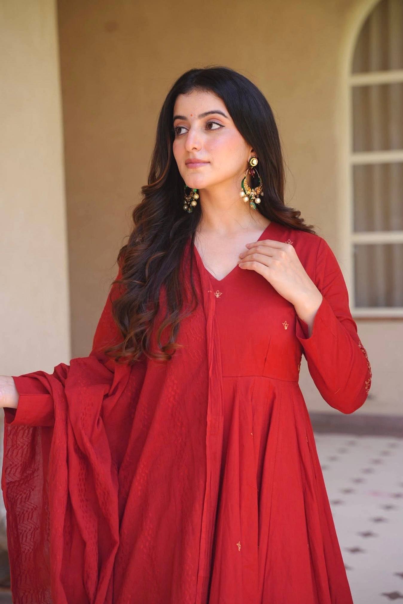 Rich Magenta Maroon Flared Anarkali Suit Set Adorned with Delicate Scattered Floral Embroidery and an Elegant V-Neckline